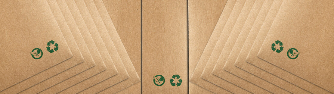 Eco-friendly labeling on a stack of cardboard boxes