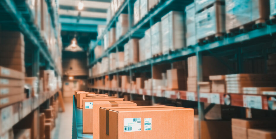 Packages on conveyor belt in a warehouse