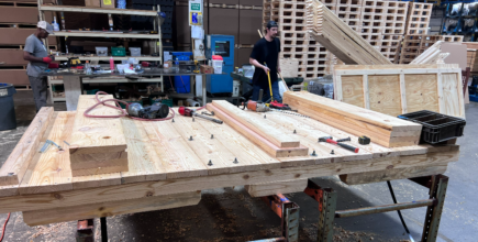 Custom wood crates being built in warehouse